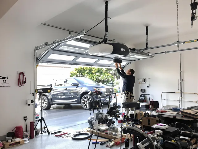 Fallbrook Garage Door Repair specialist installing smart garage door opener system in Fallbrook home