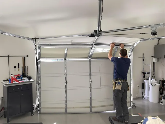 Fallbrook Garage Door Repair specialist performing precise section replacement on Fallbrook garage door